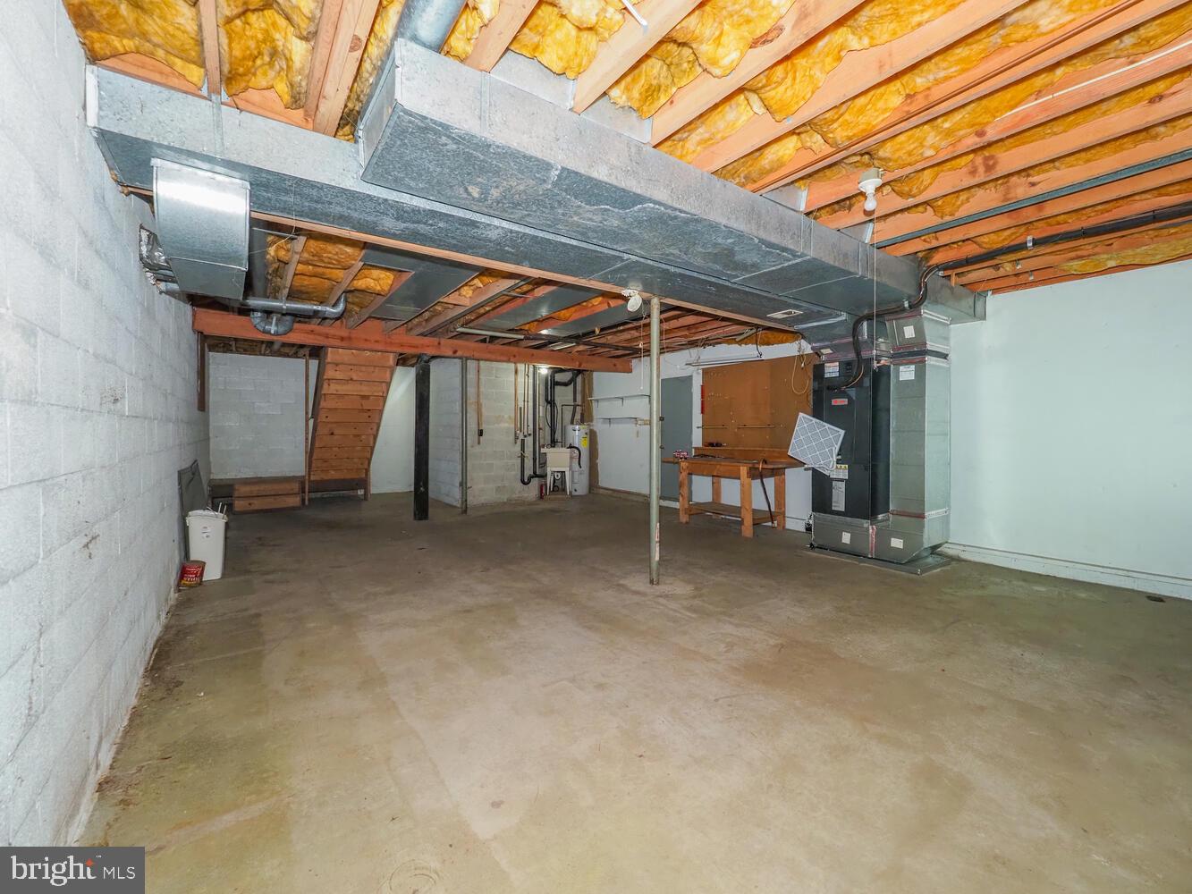 524 Ridge Road Annapolis, MD 21401 - Photo 50 of 58 Unifinshed basement with work bench
