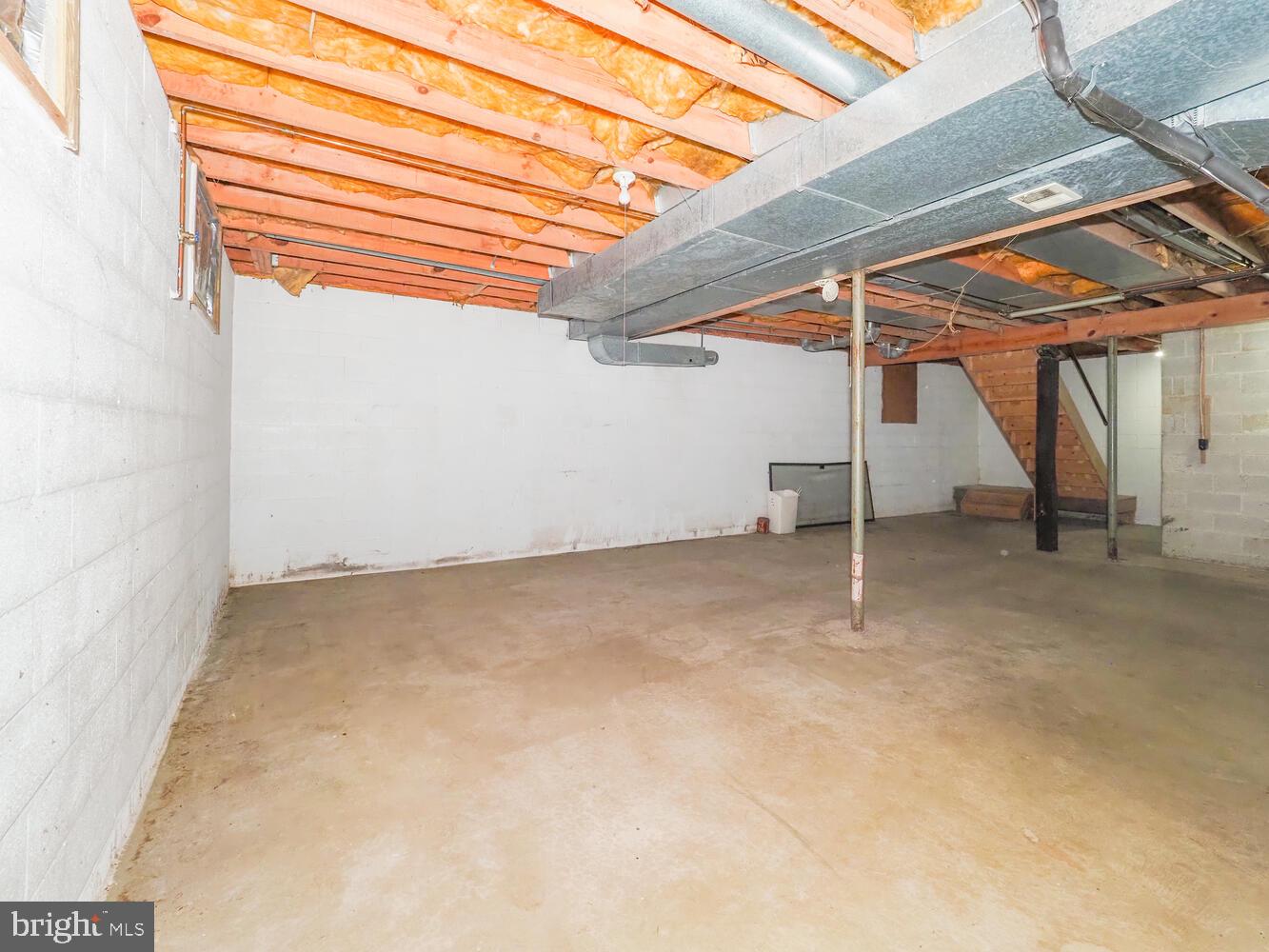 524 Ridge Road Annapolis, MD 21401 - Photo 51 of 58 an empty room with wooden floor and windows