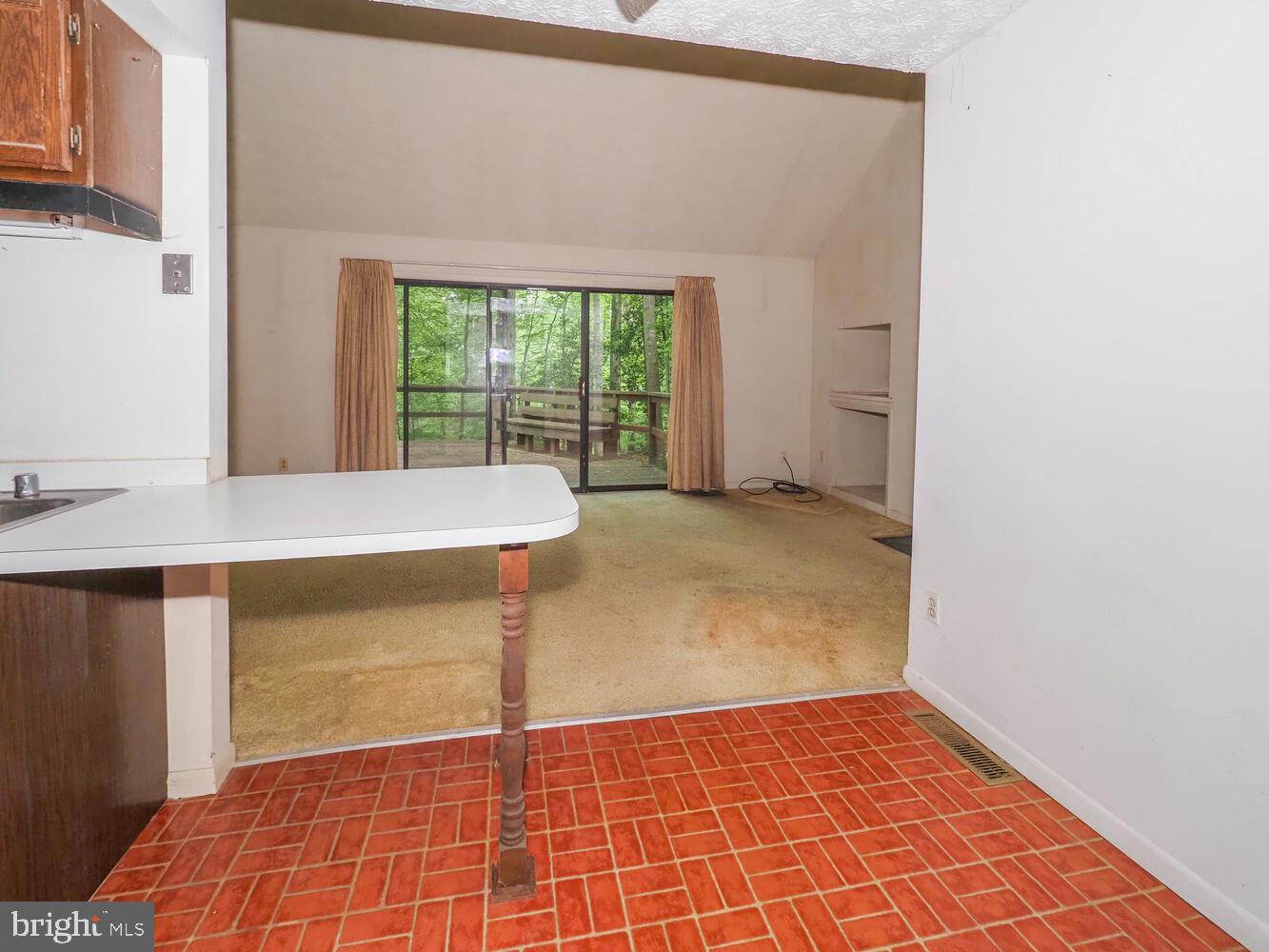 524 Ridge Road Annapolis, MD 21401 - Photo 8 of 58 a view of an empty room with a window