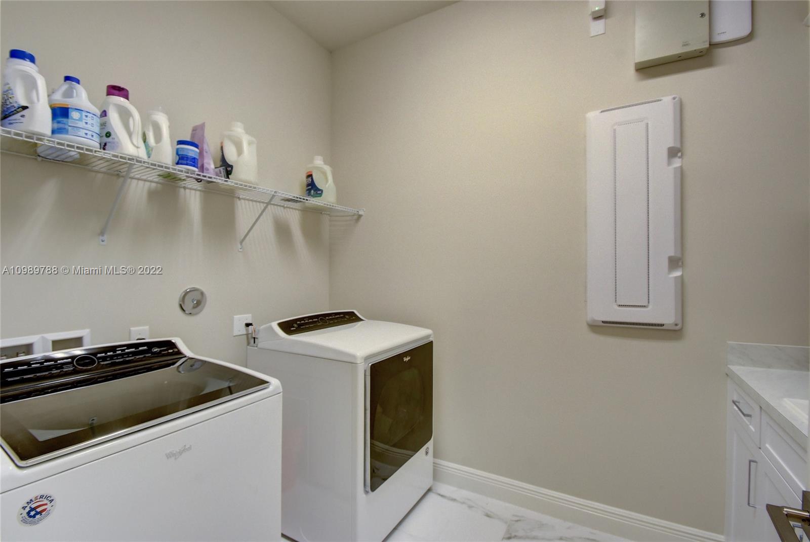 17805 Rolling Oaks Estates Dr Ranches Southwest Ranches, FL 33331 - Photo 14 of 49 a utility room with dryer and washer