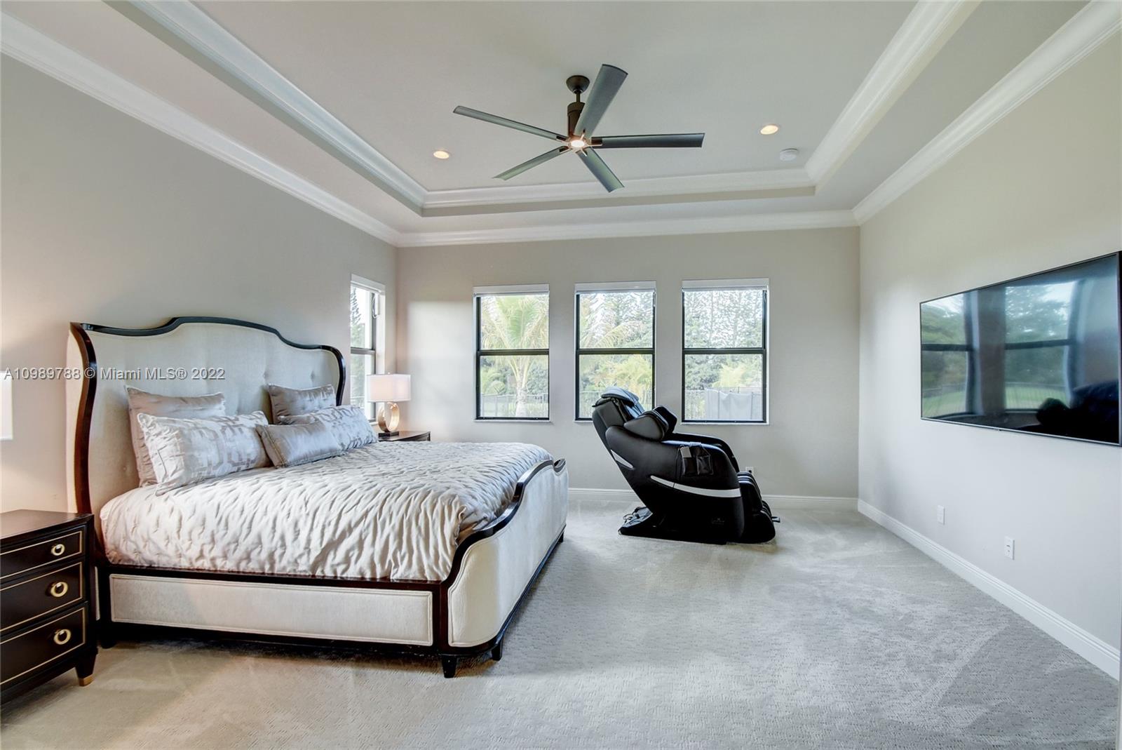 17805 Rolling Oaks Estates Dr Ranches Southwest Ranches, FL 33331 - Photo 16 of 49 a bedroom with a bed and a window