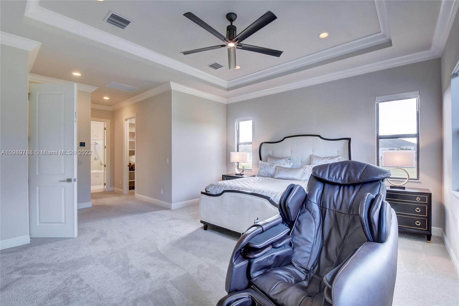 17805 Rolling Oaks Estates Dr Ranches Southwest Ranches, FL 33331 - Photo 18 of 49 a bedroom with furniture and a ceiling fan