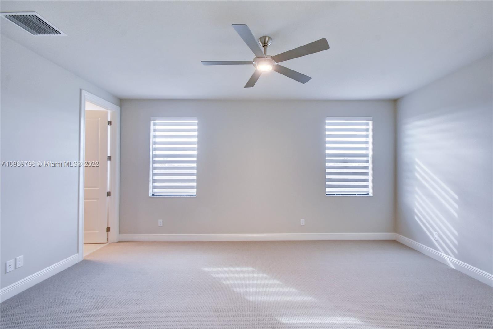 17805 Rolling Oaks Estates Dr Ranches Southwest Ranches, FL 33331 - Photo 33 of 49 a view of an empty room with a window
