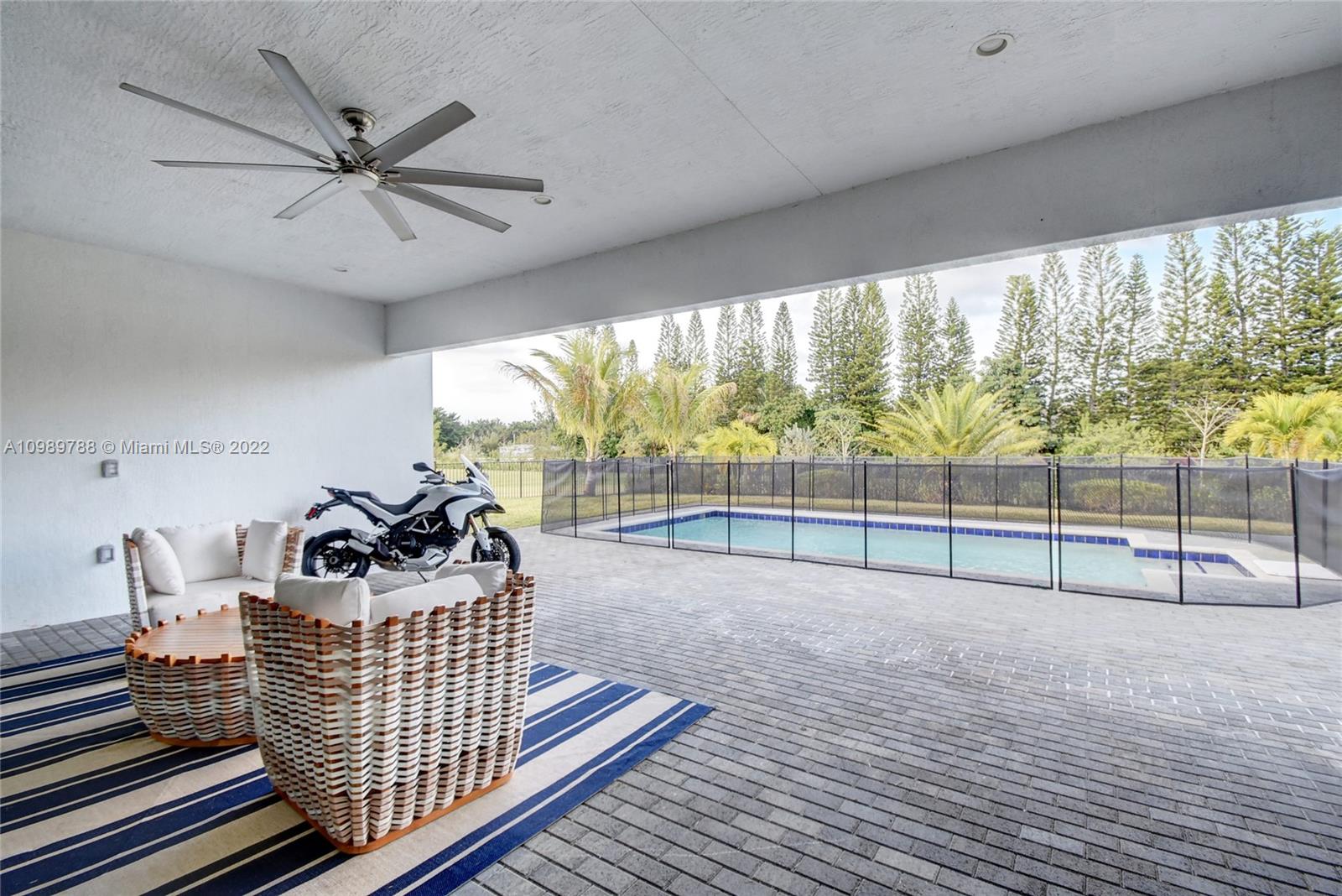 17805 Rolling Oaks Estates Dr Ranches Southwest Ranches, FL 33331 - Photo 38 of 49 a living room with furniture