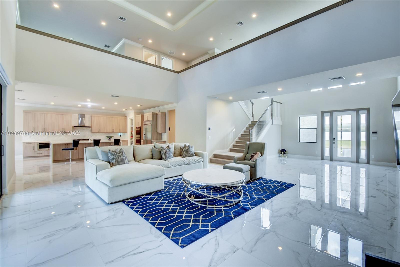 17805 Rolling Oaks Estates Dr Ranches Southwest Ranches, FL 33331 - Photo 4 of 49 a living room with furniture
