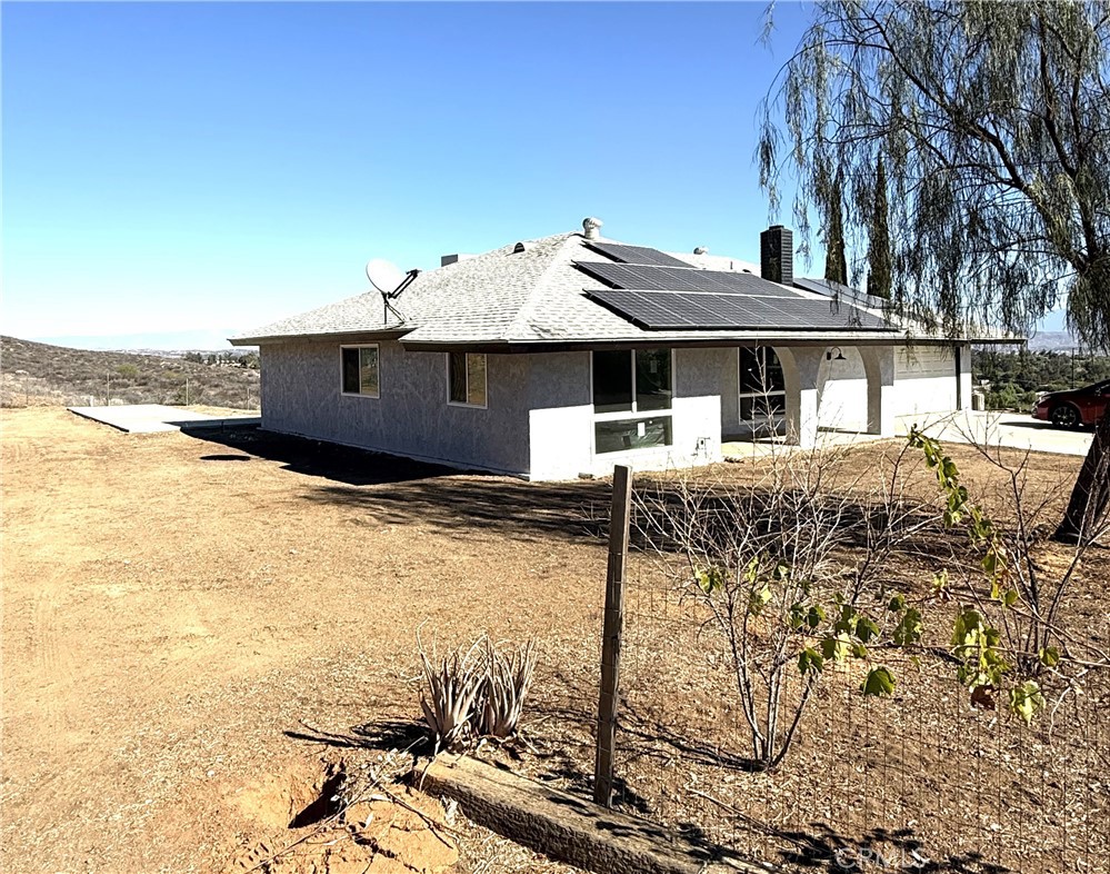 21145-21145 Kimes Lane Perris, CA 92570 - Photo 4 of 8 a view of a terrace with chairs