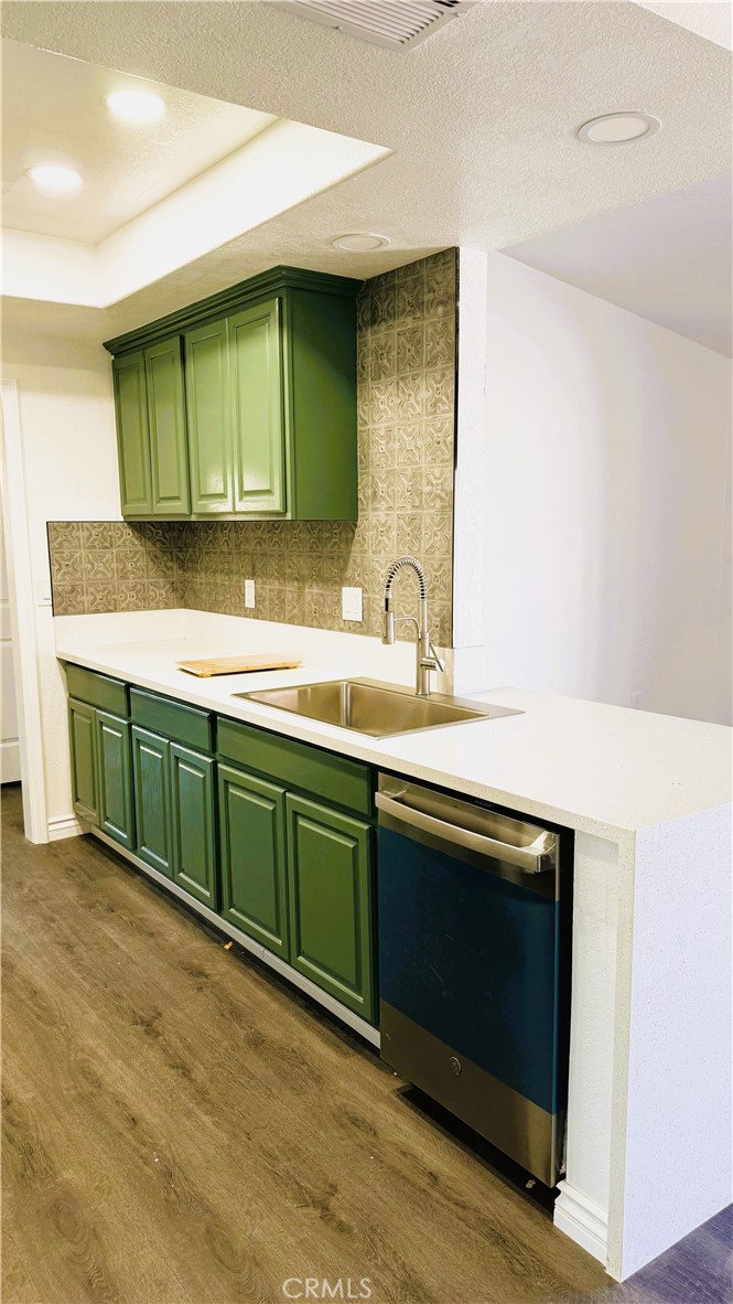 21145-21145 Kimes Lane Perris, CA 92570 - Photo 7 of 8 a bathroom with a sink and a mirror