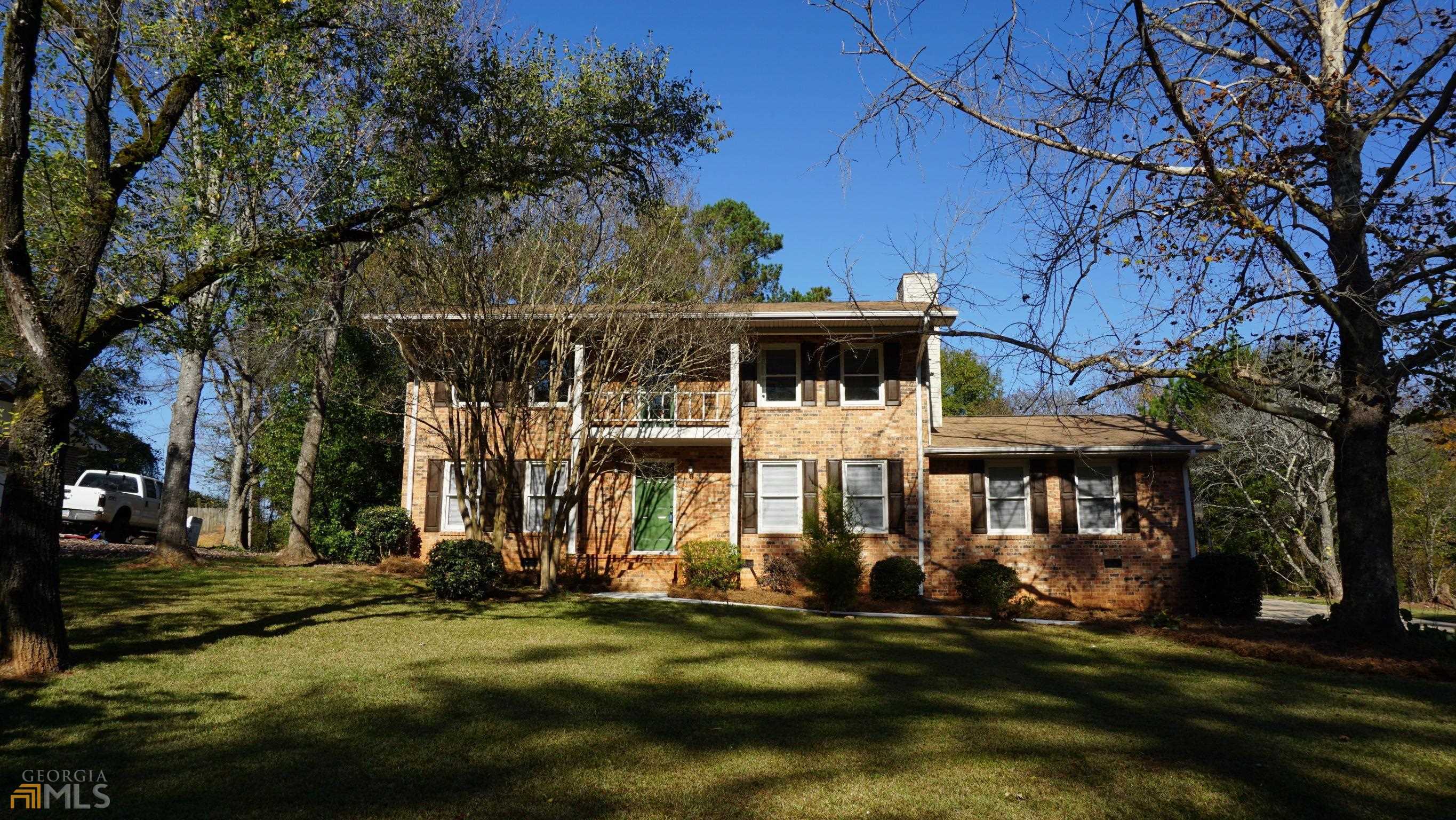 319 Rivertown Road Fairburn, GA 30213 - Photo 1 of 1 front view of a house with a yard
