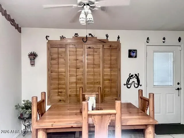 a kitchen with stainless steel appliances kitchen island granite countertop a sink and cabinets