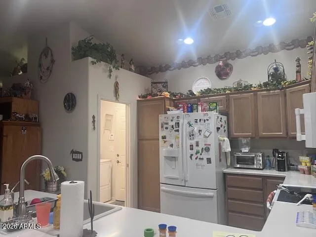 a bedroom with a bed and a table