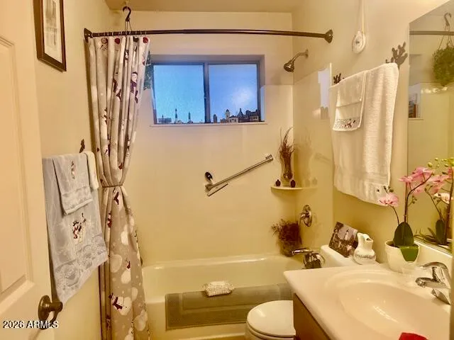 a backyard of a house with barbeque oven and outdoor seating