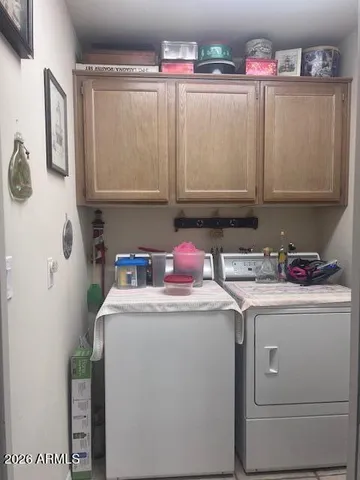 a view of a backyard with sitting area