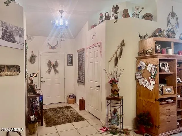 a living room with furniture a window and gym equipment