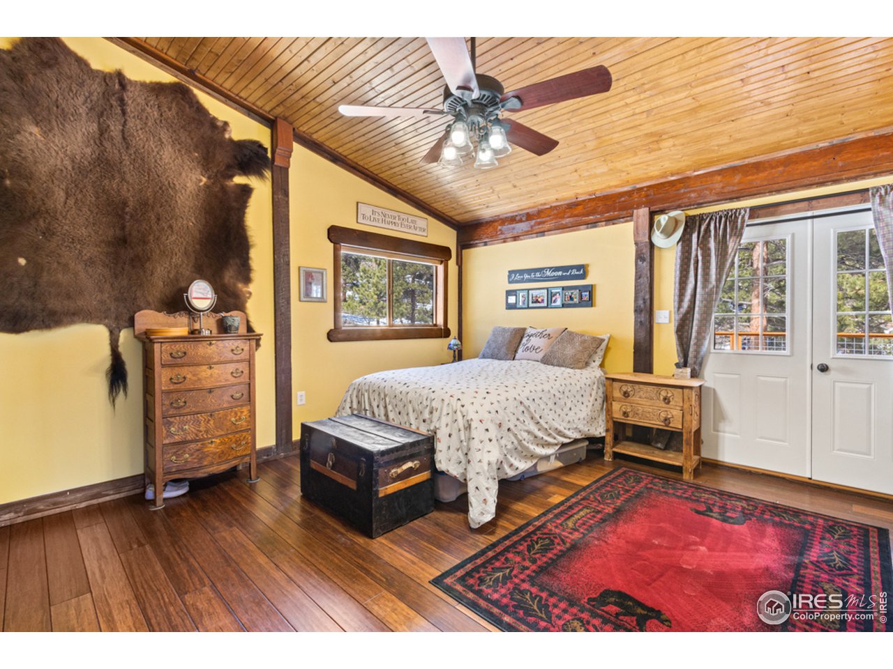 345 Caddo Road Red Feather Lakes, CO 80545 - Photo 17 of 40 primary bedroom has deck access too!