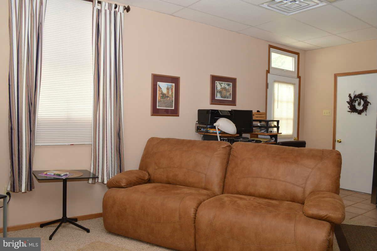 4948 Roller Road Manchester, MD 21102 - Photo 14 of 21 a living room with furniture and a window