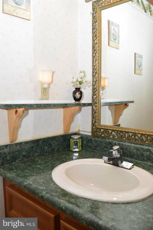 4948 Roller Road Manchester, MD 21102 - Photo 19 of 21 a bathroom with a sink and a mirror