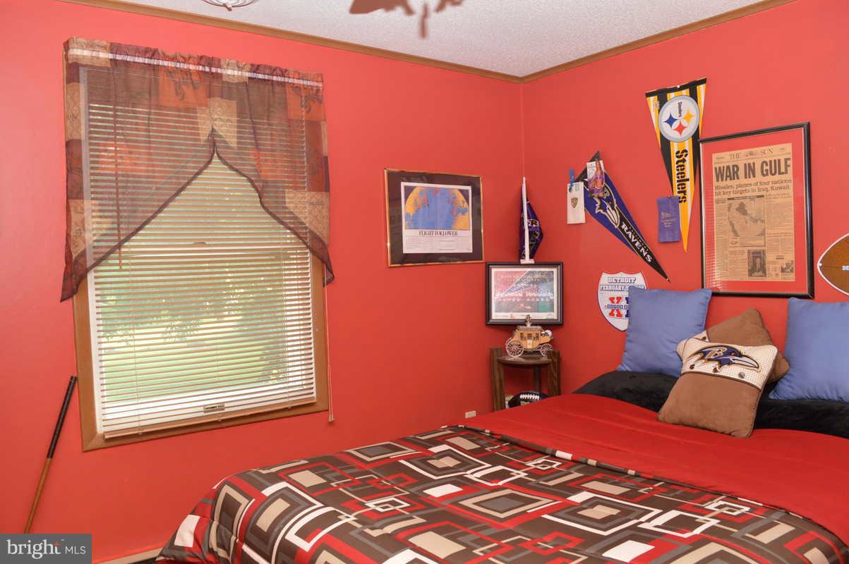 4948 Roller Road Manchester, MD 21102 - Photo 20 of 21 a bedroom with a bed and a window