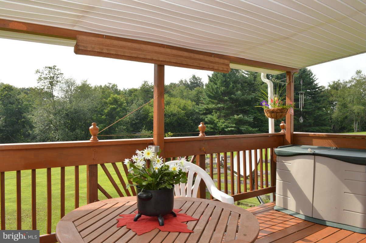 4948 Roller Road Manchester, MD 21102 - Photo 7 of 21 a view of a balcony with wooden floor