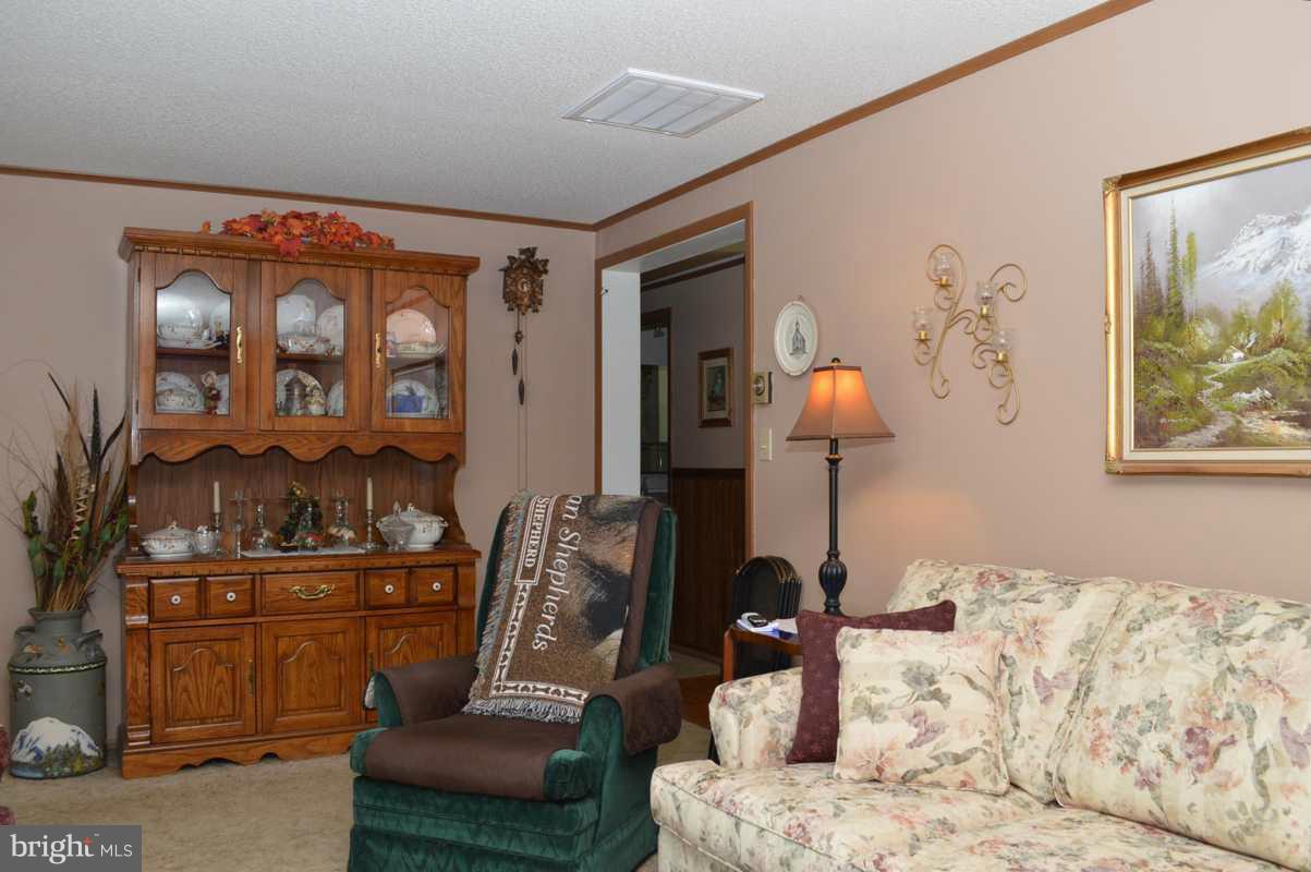 4948 Roller Road Manchester, MD 21102 - Photo 10 of 21 a living room with furniture and a window
