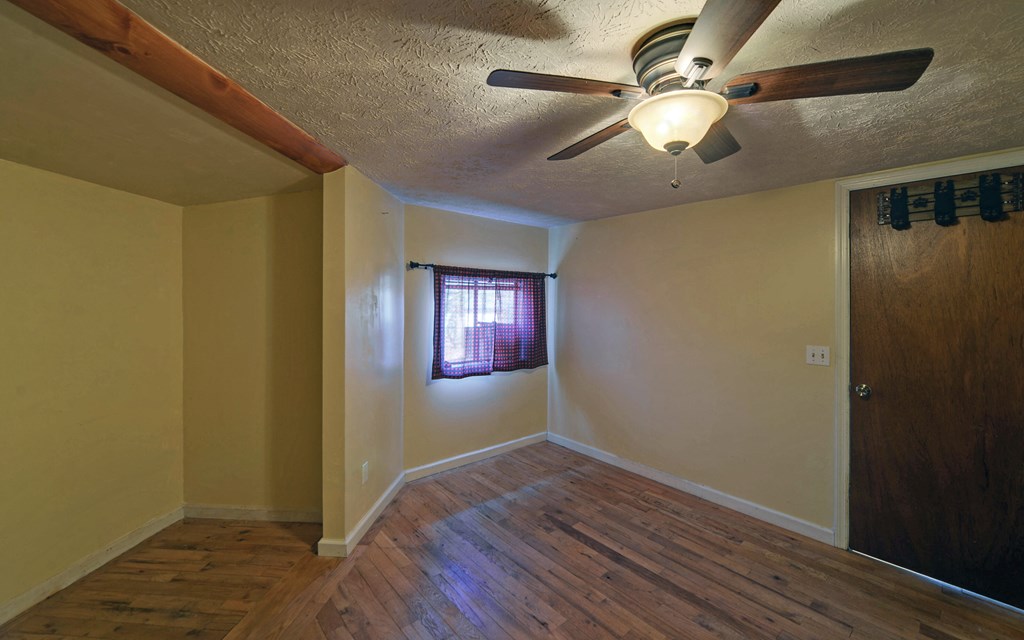 15 Trails End Road Blue Ridge, GA 30513 - Photo 11 of 46 wooden floor in an empty room
