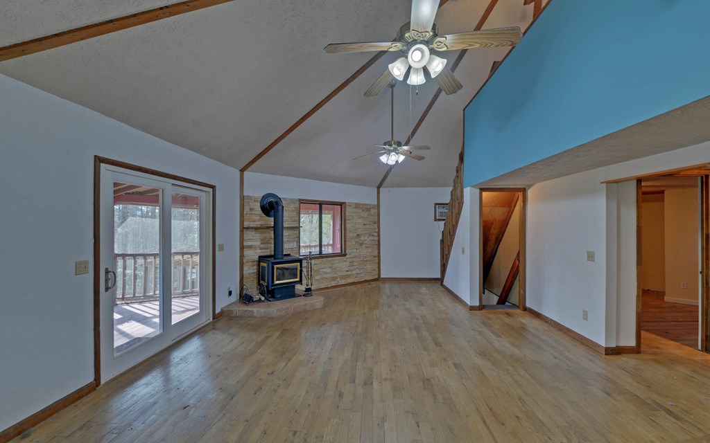 15 Trails End Road Blue Ridge, GA 30513 - Photo 2 of 46 wooden floor in an empty room with a window