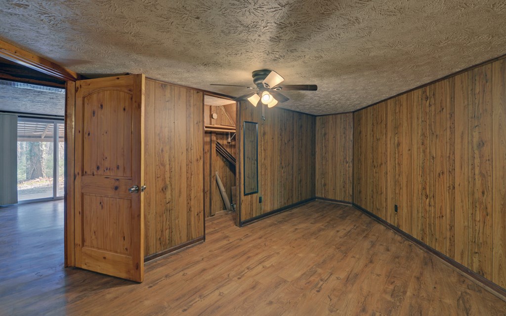 15 Trails End Road Blue Ridge, GA 30513 - Photo 23 of 46 a view of a hallway with wooden floor