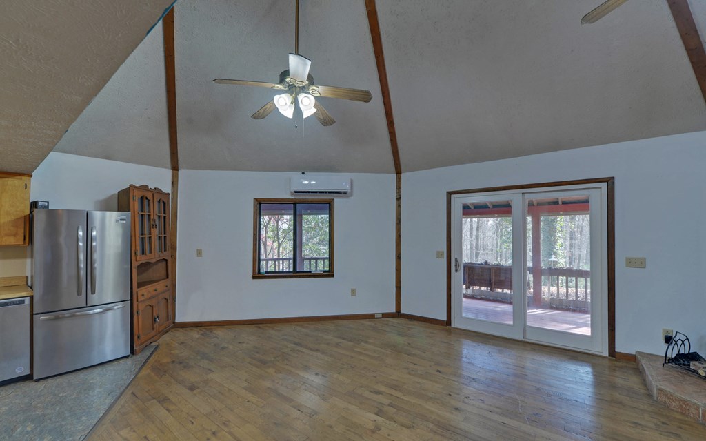 15 Trails End Road Blue Ridge, GA 30513 - Photo 7 of 46 a view of a livingroom with a furniture wooden floor and chandelier