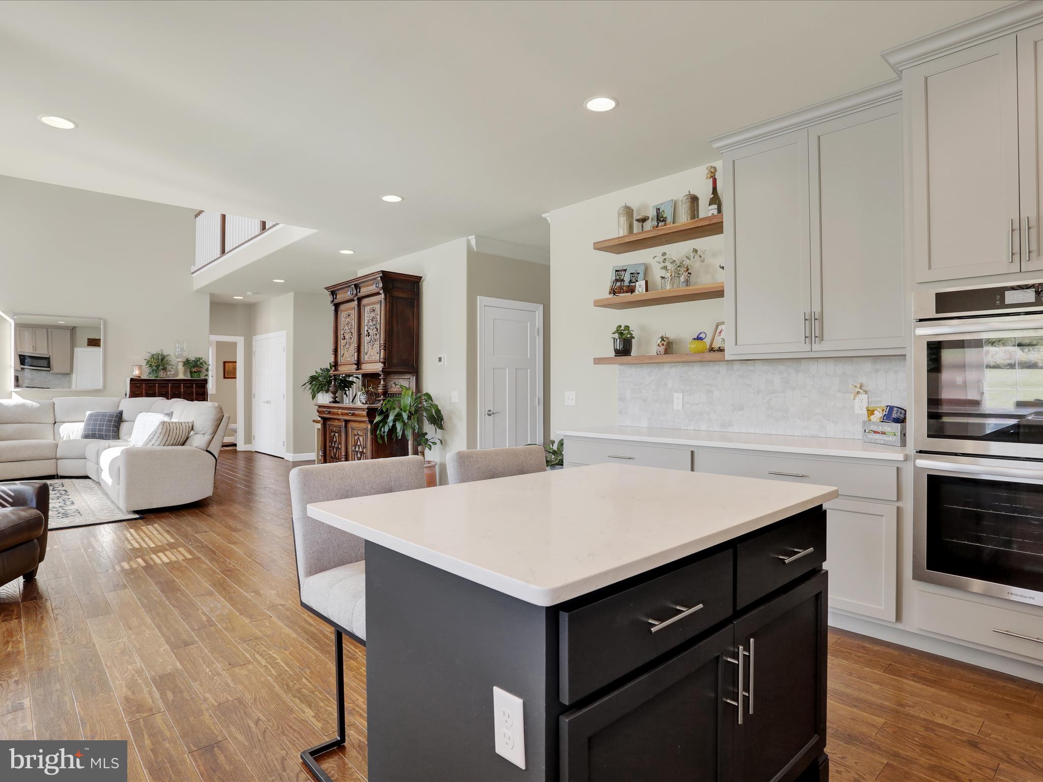 344 Hampshire Road Reading, PA 19608 - Photo 15 of 43 a kitchen with a refrigerator and a stove top oven