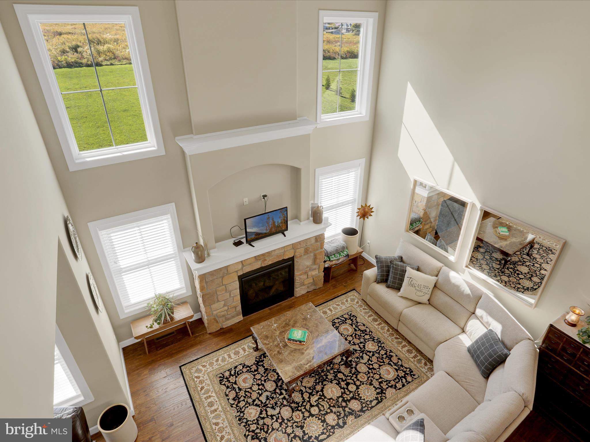 344 Hampshire Road Reading, PA 19608 - Photo 21 of 43 a living room with furniture and a fireplace