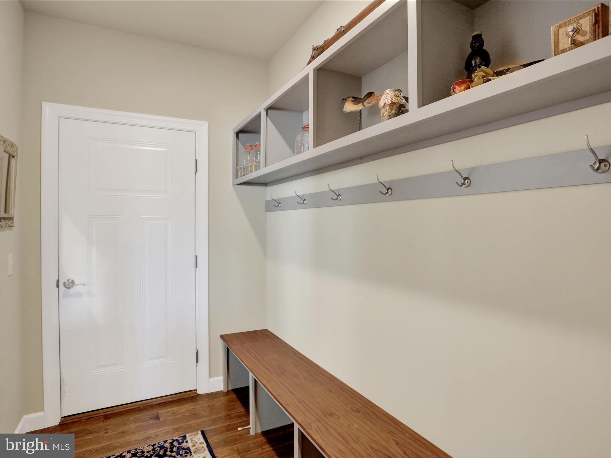 344 Hampshire Road Reading, PA 19608 - Photo 22 of 43 a room with a table and wooden floor