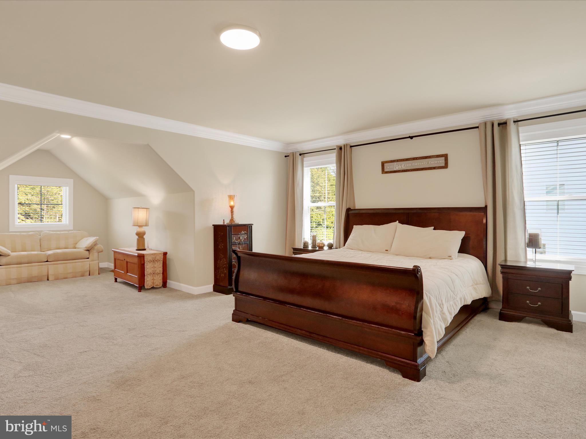 344 Hampshire Road Reading, PA 19608 - Photo 24 of 43 a spacious bedroom with a bed and window