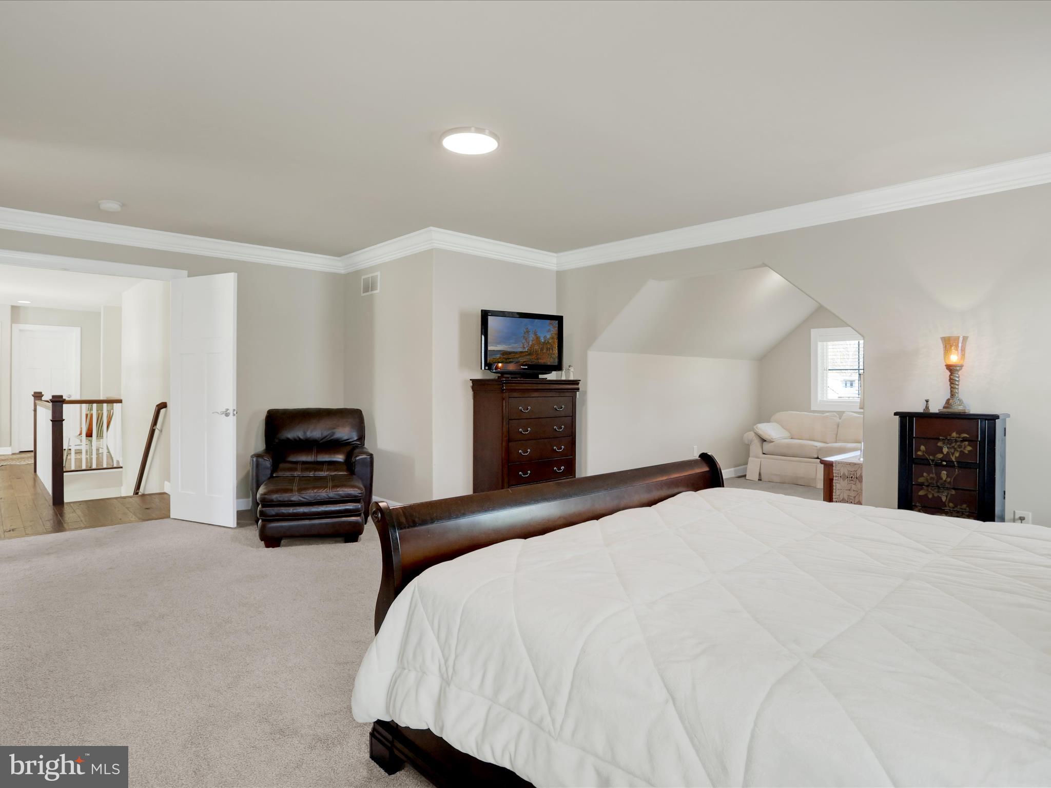 344 Hampshire Road Reading, PA 19608 - Photo 25 of 43 a bedroom with a bed and a television