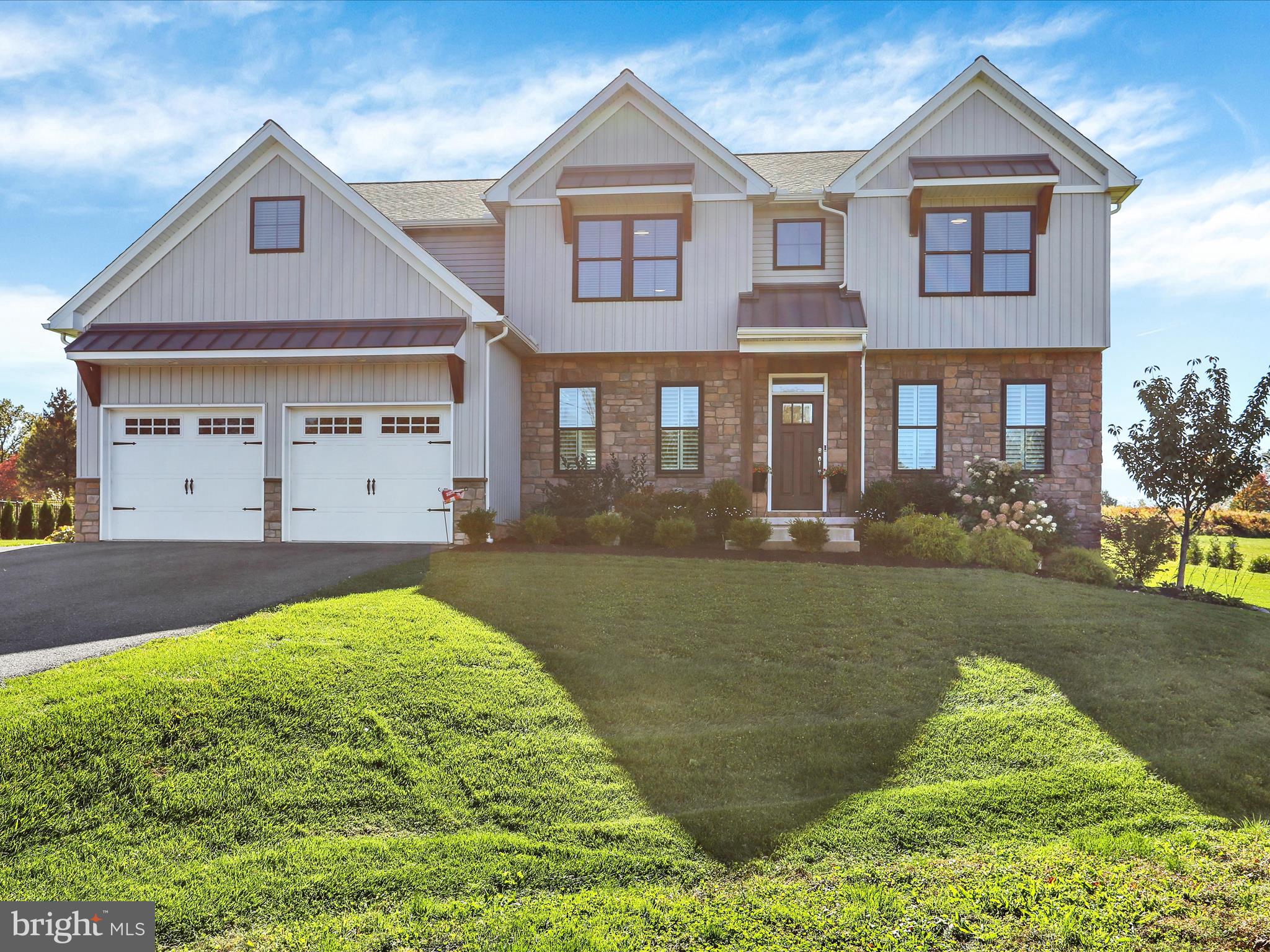 344 Hampshire Road Reading, PA 19608 - Photo 35 of 43 front view of a house with a yard