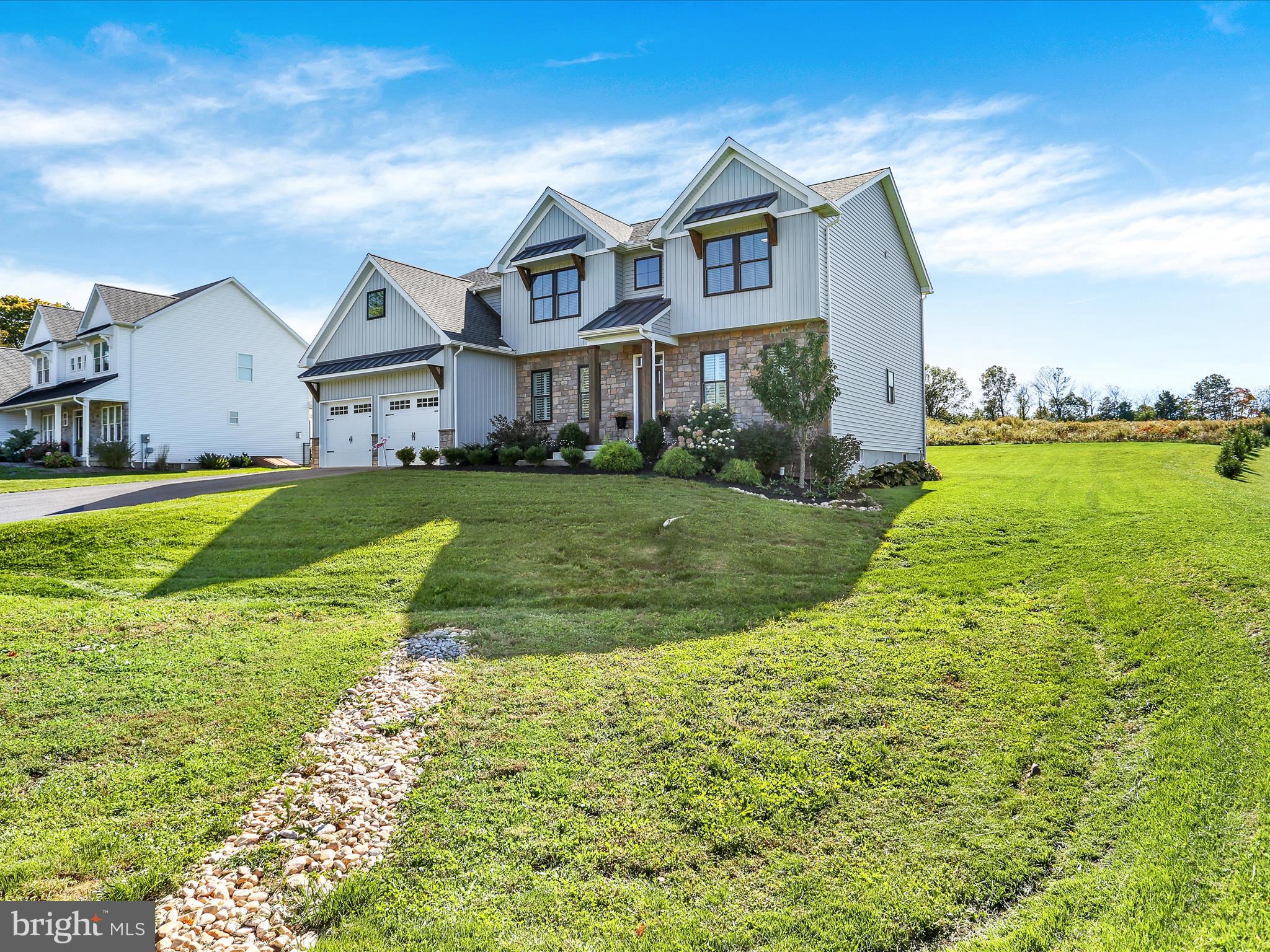 344 Hampshire Road Reading, PA 19608 - Photo 37 of 43 a front view of a house with a yard