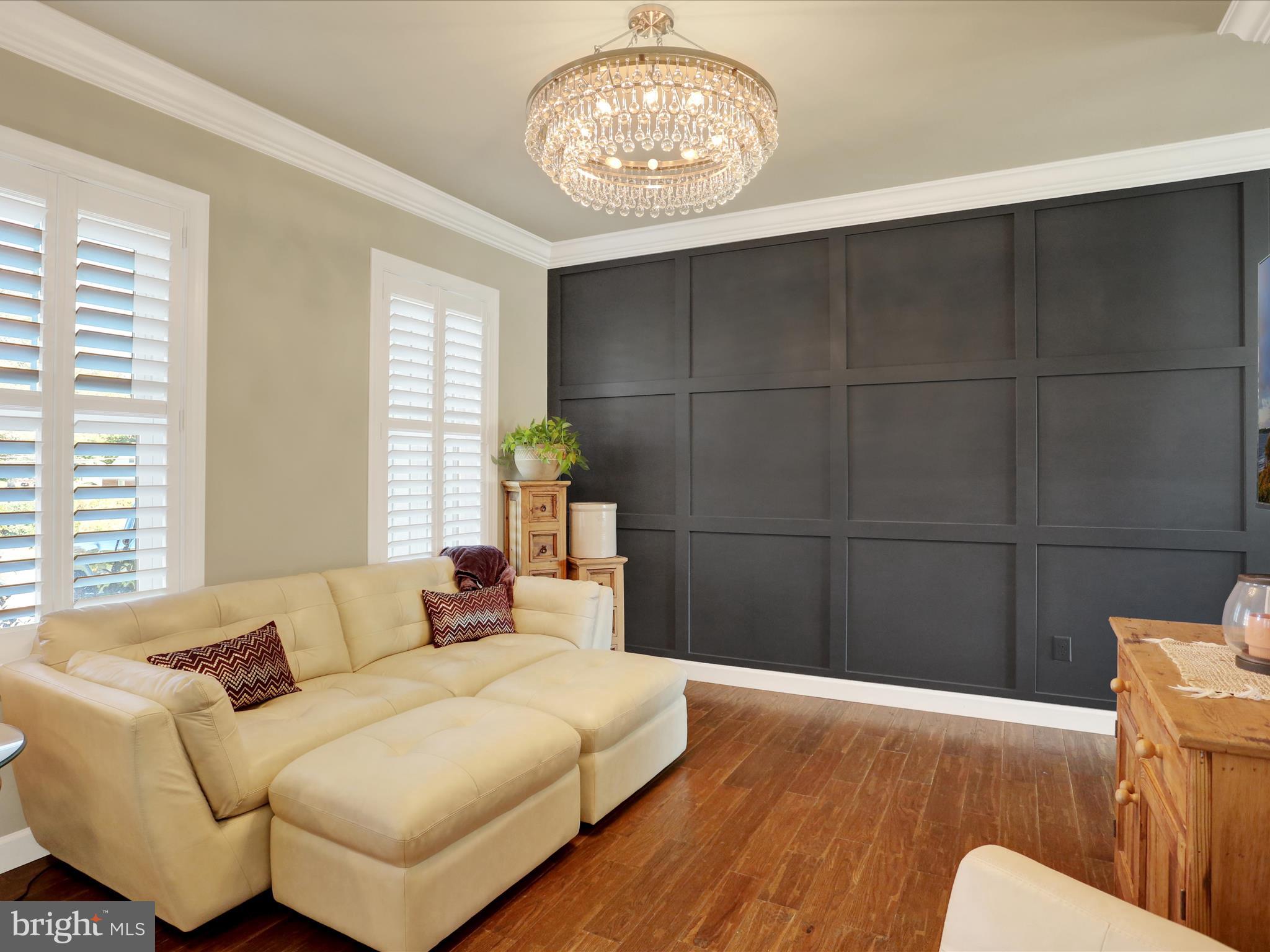 344 Hampshire Road Reading, PA 19608 - Photo 6 of 43 a bedroom with a bed and a couch