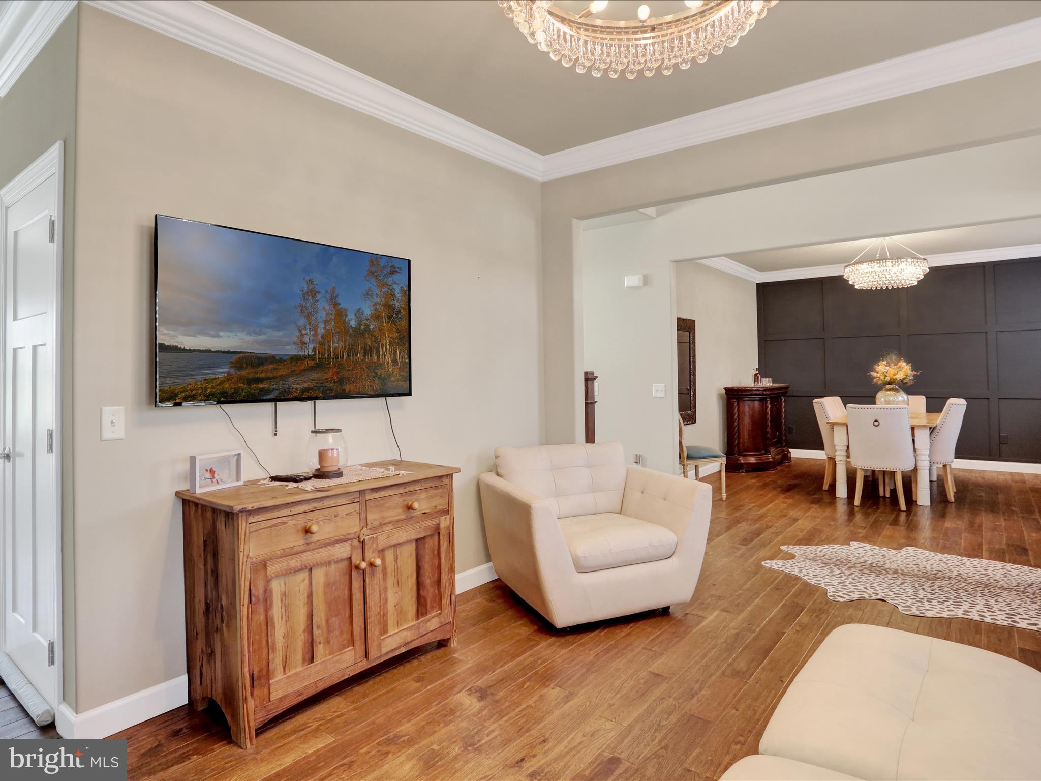 344 Hampshire Road Reading, PA 19608 - Photo 7 of 43 a living room with furniture and a flat screen tv