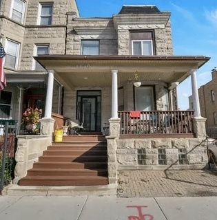 a view of a building with a fountain of the house