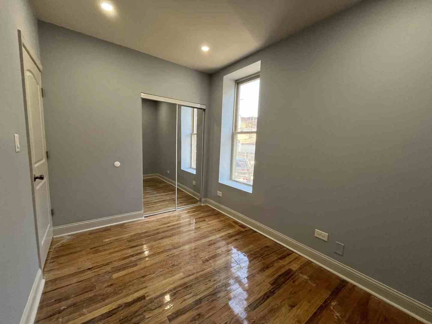 1446 West Irving Park Road, Unit 1 Chicago, IL 60613 - Photo 12 of 45 a view of an empty room and window