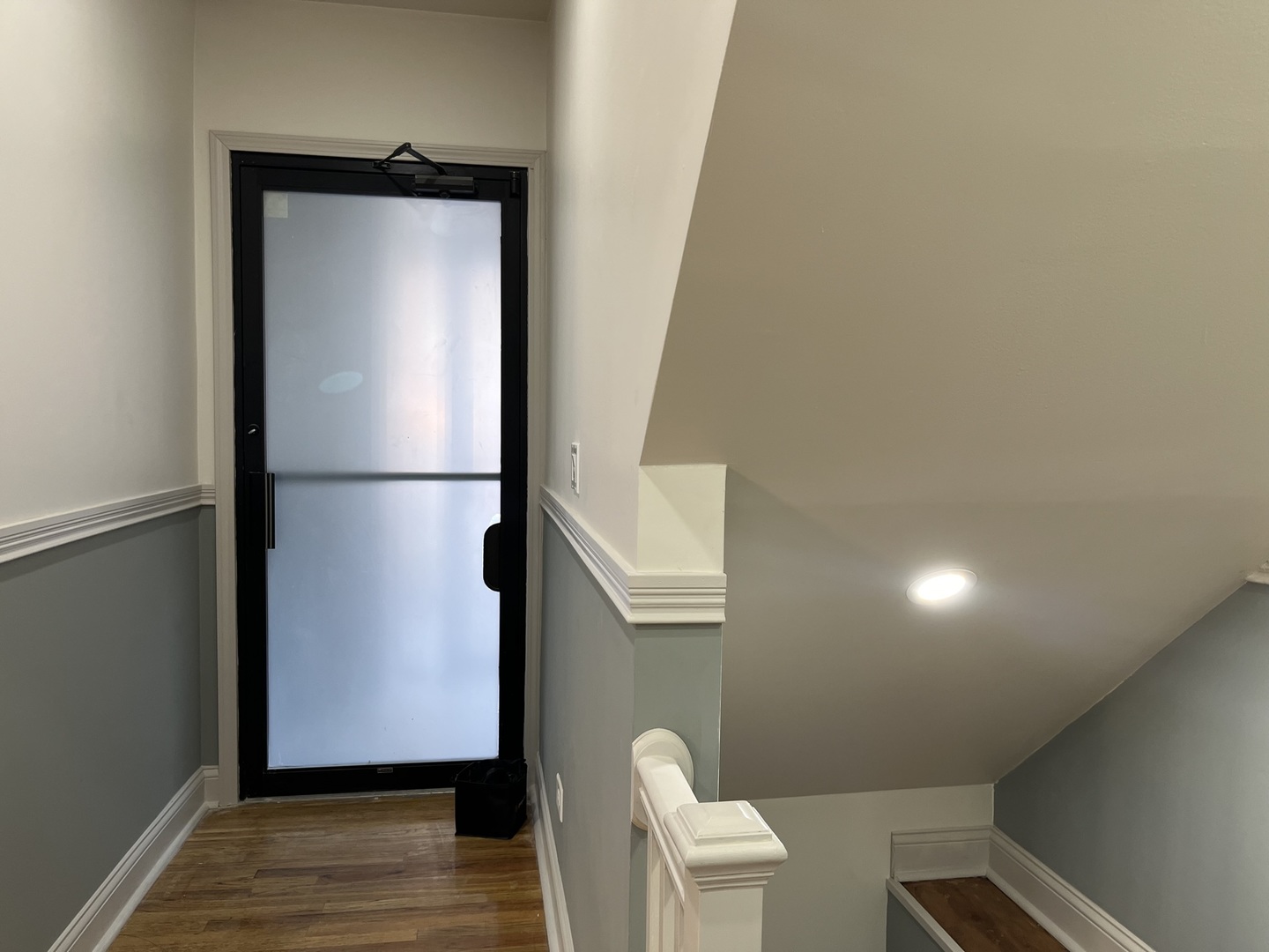 1446 West Irving Park Road, Unit 1 Chicago, IL 60613 - Photo 4 of 24 a view of entryway and hall with wooden floor