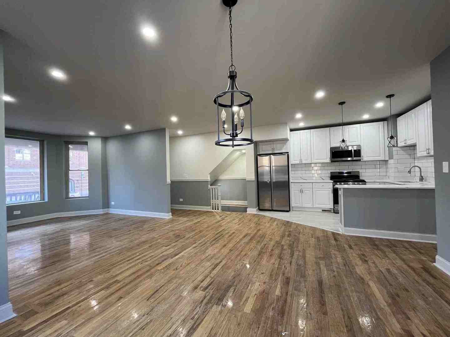 1446 West Irving Park Road, Unit 1 Chicago, IL 60613 - Photo 9 of 45 a view of kitchen with sink and refrigerator