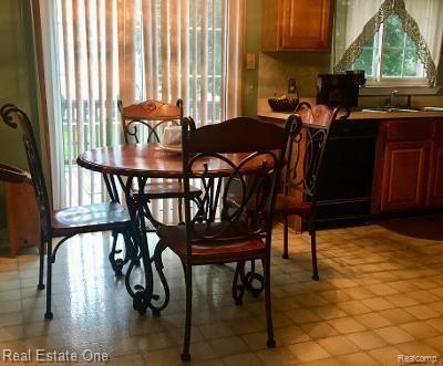560 Arlington Drive Rochester, MI 48307 - Photo 6 of 16 BREAKFAST AREA AND DOORWALL TO DECK