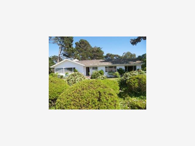 3003 Cormorant Road Pebble Beach, CA 93953 - Photo 6 of 9 a black and white photo of a building