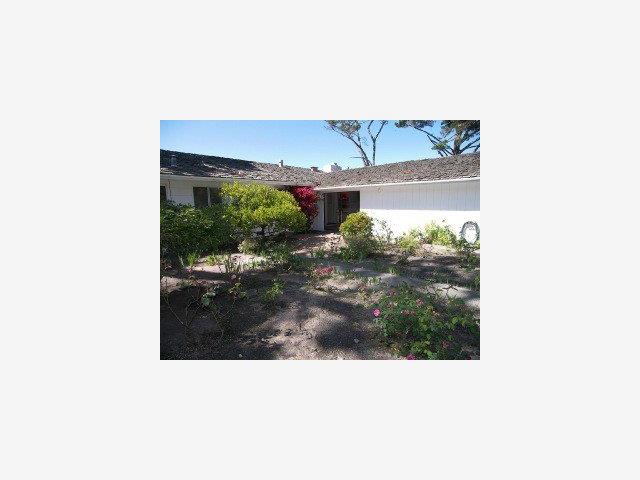 3003 Cormorant Road Pebble Beach, CA 93953 - Photo 9 of 9 a picture of a person on a street