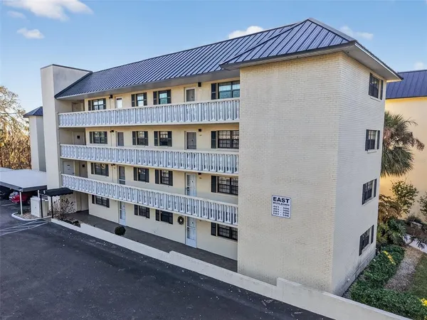 a view of front of residential houses with stairs
