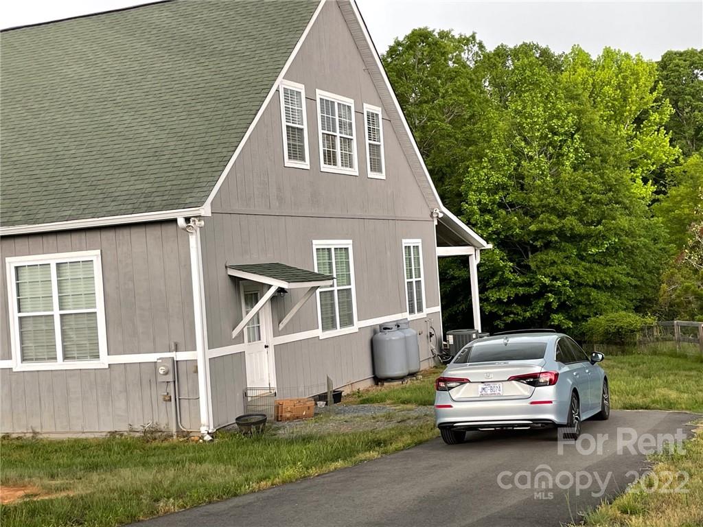 a house view with a garden space