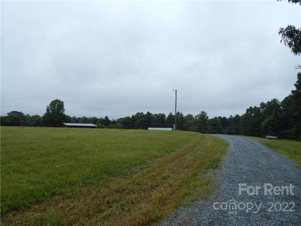 5312 Davis Road, Unit A Waxhaw, NC 28173 - Photo 12 of 12 a view of a golf course with a lake