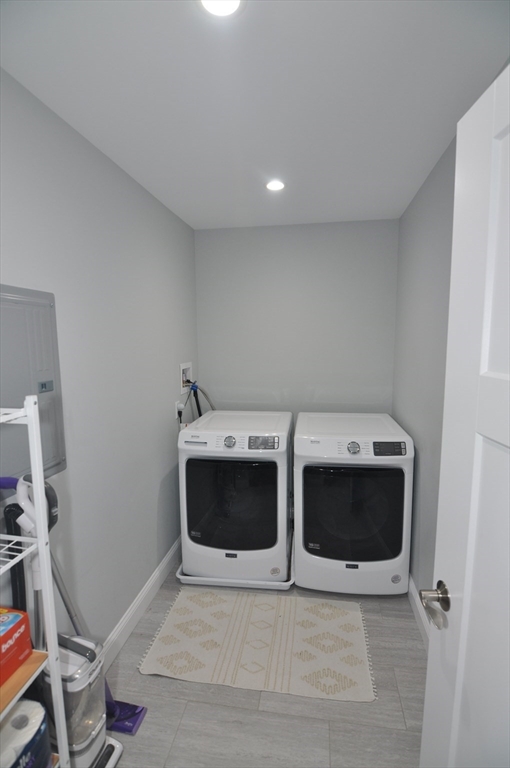 47 Maple Street, Unit A Middleton, MA 01949 - Photo 23 of 29 a view of a room with storage and utility