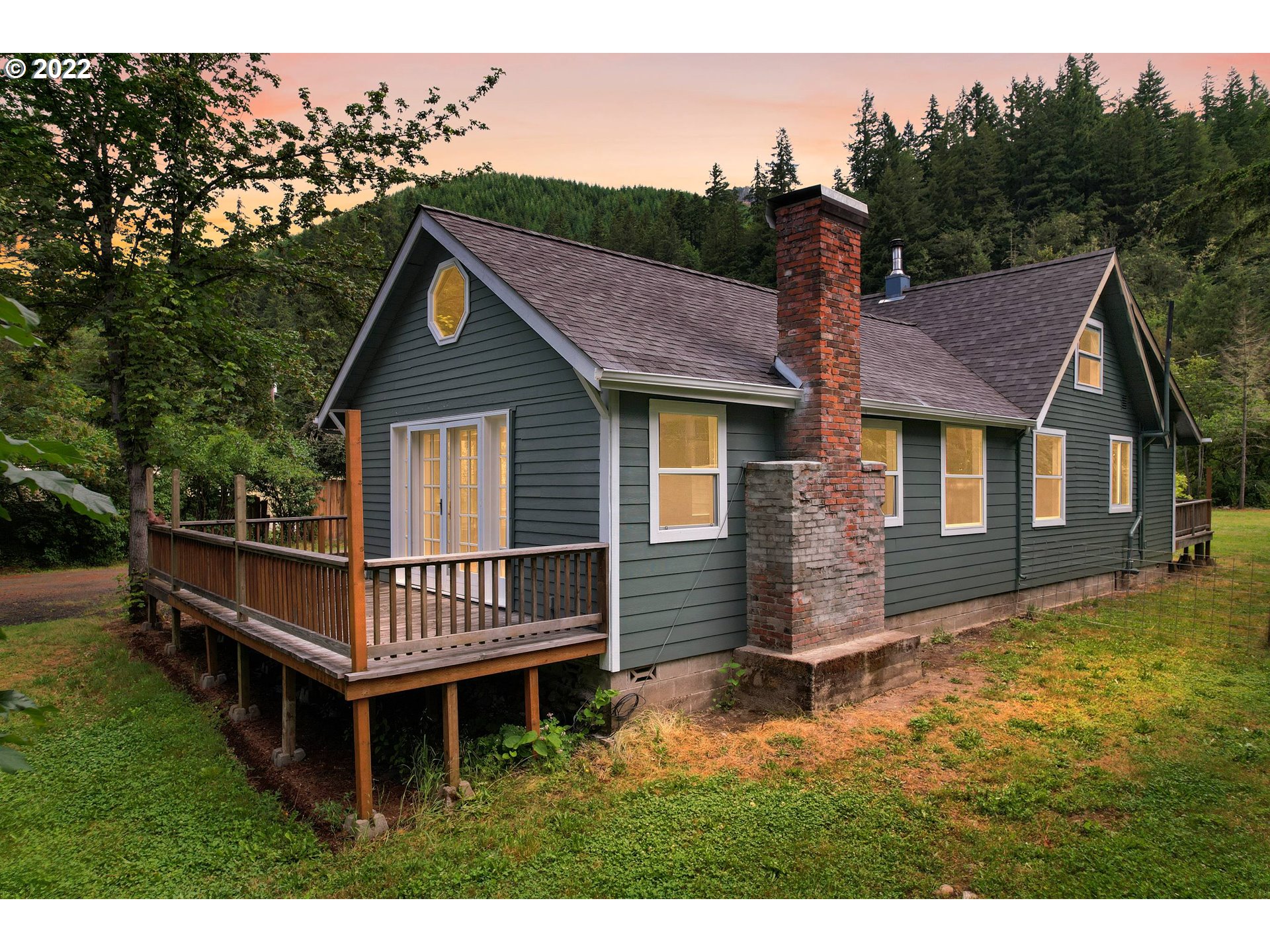 37863 Row River Road Dorena, OR 97434 - Photo 3 of 25 a house view with a garden space