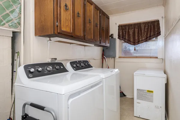 a kitchen with a stove and a microwave