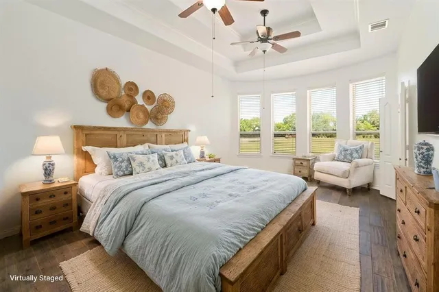 a view of a dining room with furniture and a potted plant